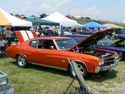 ORANGE CHEVELLE WITH WHITE STRIPES